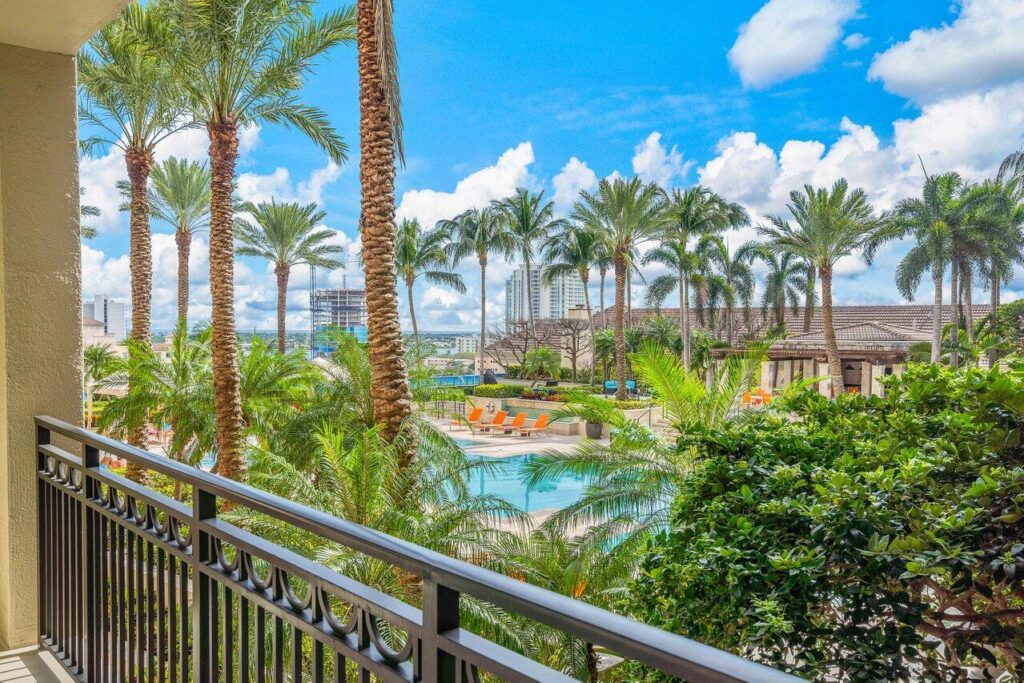 Balcony Pool Views from CityPlace South Tower Unit 1007 at 550 Okeechobee Blvd in West Palm Beach, sold by The Keller Team