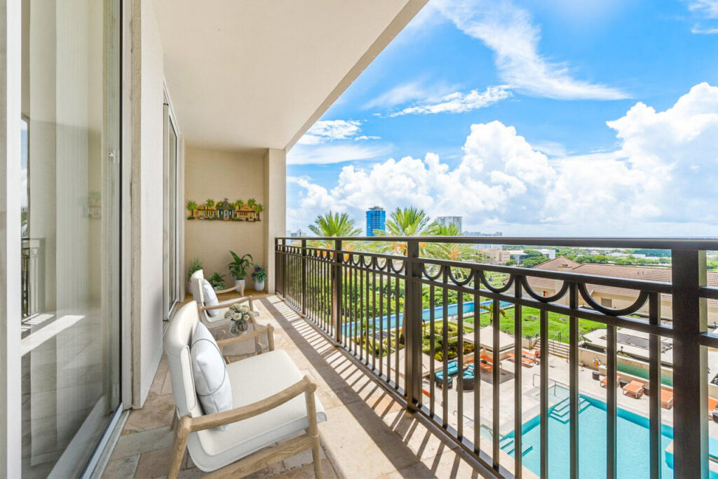 Balcony Pool Views from CityPlace South Tower Unit 1203 at 550 Okeechobee Blvd in West Palm Beach, sold by The Keller Team